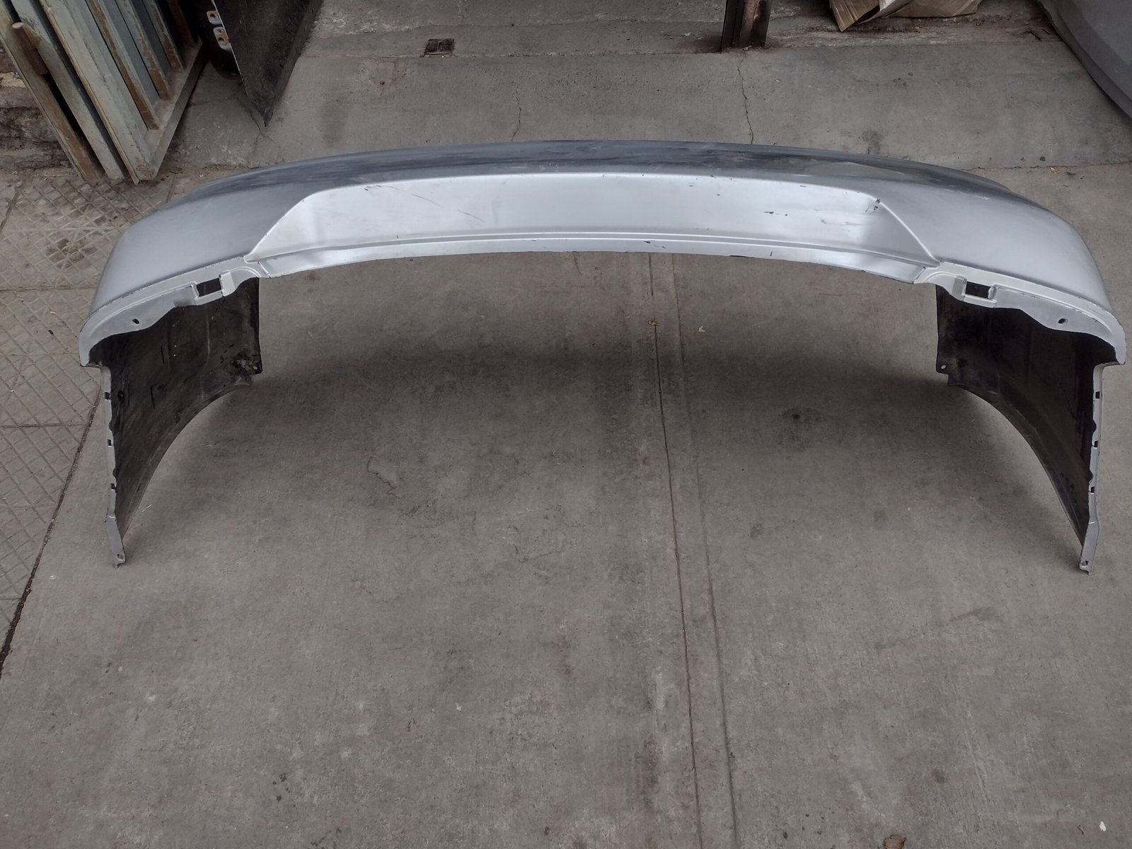 Parachoque trasero Nissan tida sedan 2009 - 2016 - Imagen 5