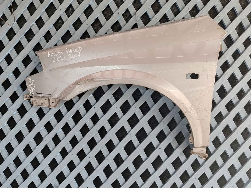Tapabarro izquierdo Nissan Primera 2003 - 2007