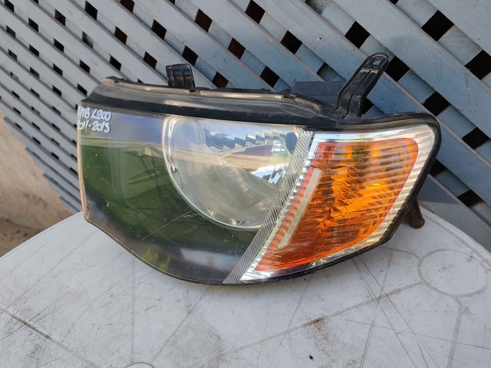 Óptico izquierdo Mitsubishi L200 2010 - 2015 - Imagen 3