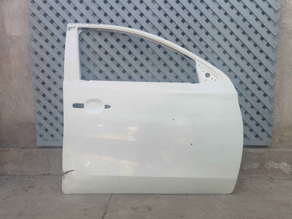 Puerta delantera derecha Mitsubishi L200 2016 - 2024 (II)