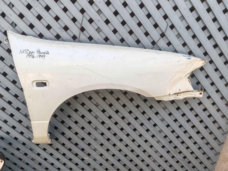 Tapabarro derecho Nissan Primera 1996 - 1999 - Imagen 2