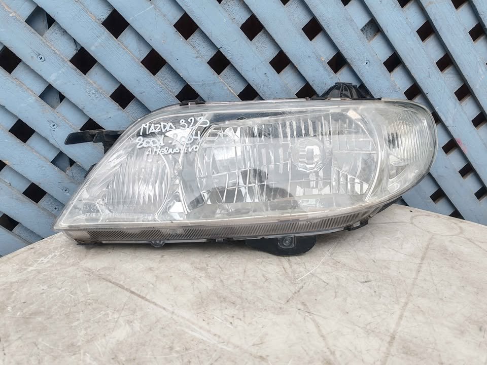 Óptico izquierdo Mazda 323 2001 - 2004
